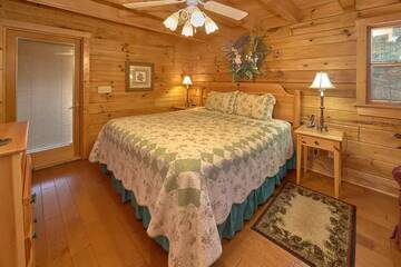 Your cabin's first bedroom with king bed.
